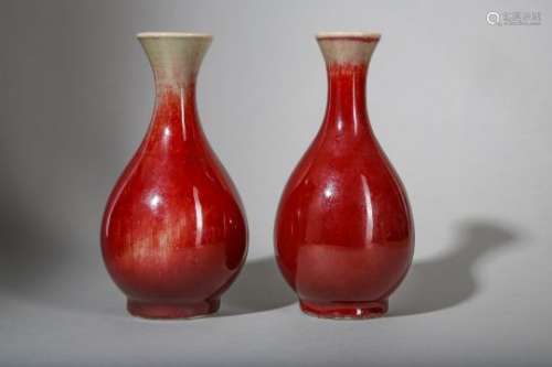 A PAIR OF CHINESE COPPER RED-GLAZED VASES.