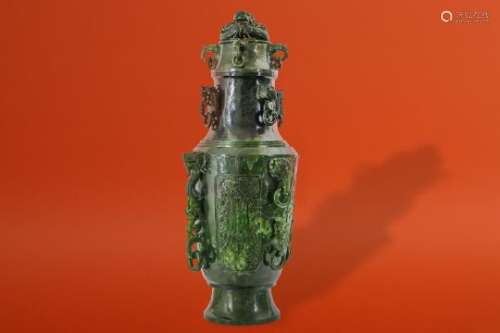 A MASSIVE CHINESE SPINACH JADE 'DRAGON' VASE AND COVER.