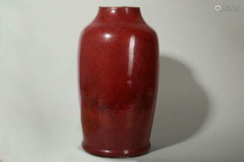 A LARGE CHINESE COPPER RED-GLAZE VASE.