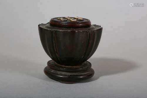 λ A CHINESE CARVED ZITAN WOOD 'LOTUS POD' CRICKET BOX.