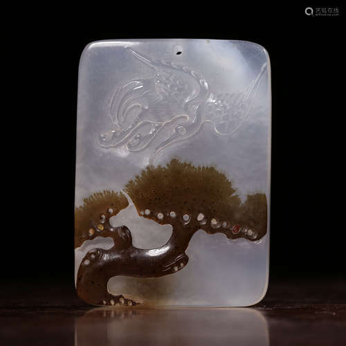 A Chinese Agate Carved Pine And Crane Pendant