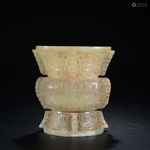 A Chinese Jade Tao Tie Beaker Vase