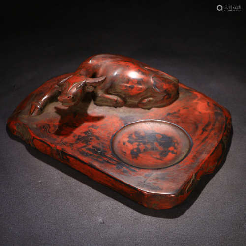 A Chinese Carved Duan Stone Cinnabar Inkstone