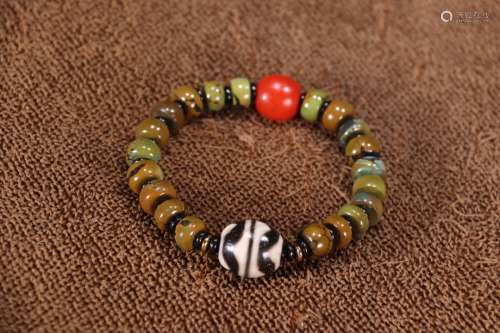 A Tibetan Turquoise Stone Bracelet With Dzi