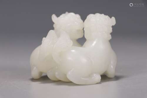 A Chinese Hetian Jade Lion Ornament