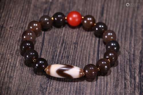 A Tibetan Agate Bracelet With Dzi