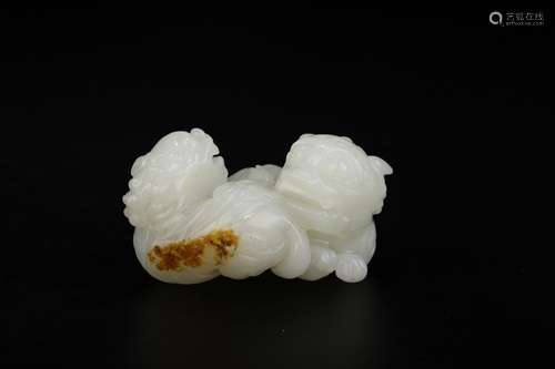 A Chinese Hetian Jade Lion Ornament