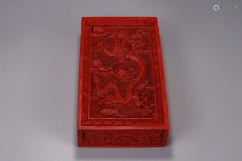 A Chinese Red Lacquerware Dragon Carved Box