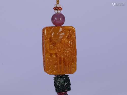 A Chinese Amber Pendant