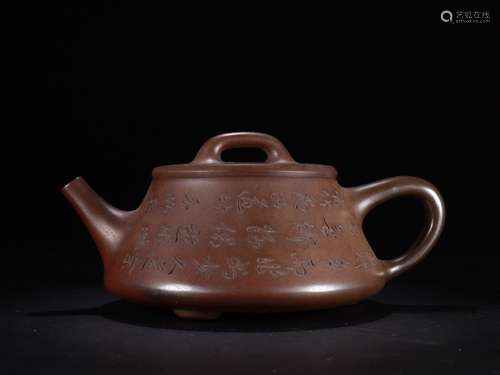 A Chinese Zisha Teapot Of Poetry Carving