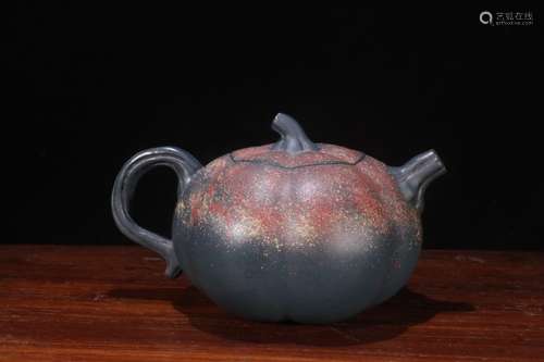 A Chinese Zisha Teapot Of Pumpkin Shaped