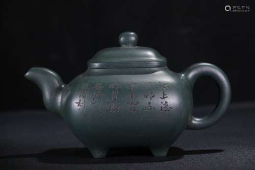 A Chinese Zisha Teapot Of Poetry Carving