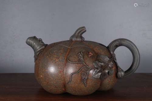 A Chinese Zisha Teapot Of Pumpkin Shaped