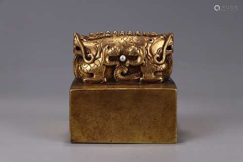 A Chinese Gilt Bronze Dragon Button Seal