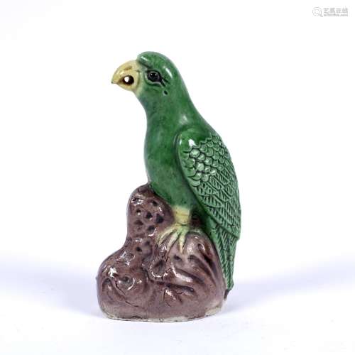 Porcelain miniature model of a green glazed parrot Chinese, 19th Century Kangxi style, with yellow