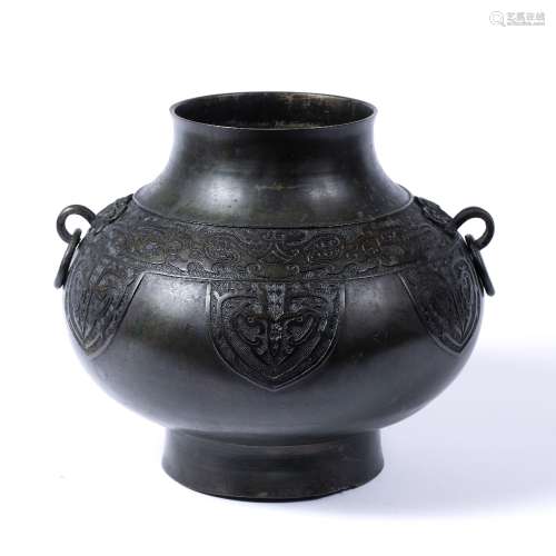 Bronze archaic form vase Chinese with looped handles and green patination, 29cm wide x 24cm high