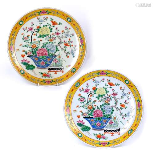 Pair of porcelain chargers Japanese decorated in polychrome enamels with baskets of flowering peony,