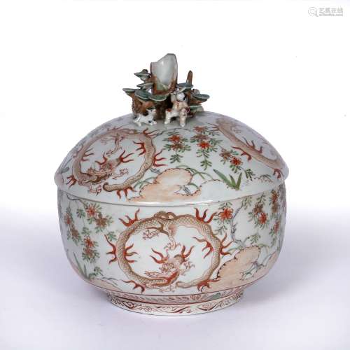 Porcelain bowl and cover Japanese 18th Century the handle in the form of small seated figures,