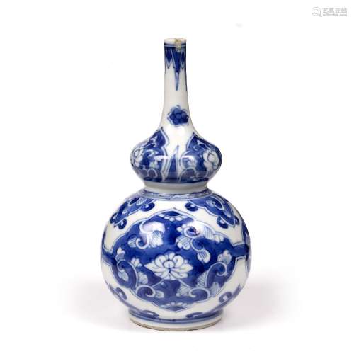 Small blue and white double gourd bottle vase Chinese, Kangxi (1662-1722) with panels of lotus and