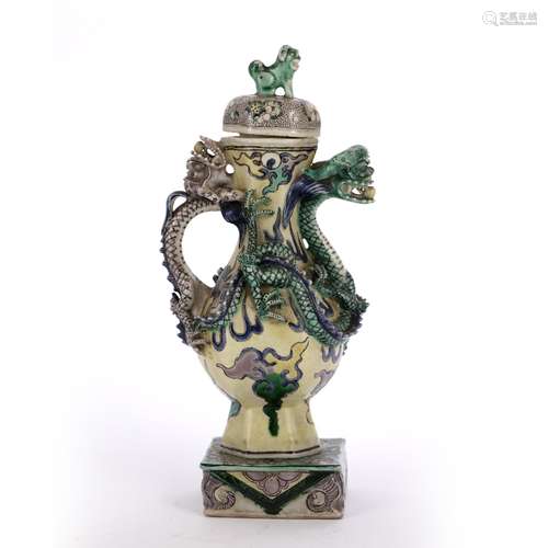 Sancai vase Chinese, 19th Century modelled as a dragon with his head as a spout, the finial modelled