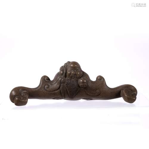 Yixing brush rest Chinese, 20th Century in the form of a sage, impressed seal mark, 19cm across