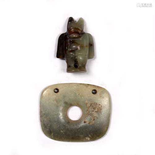 Archaic style jade plaque Chinese with a central hole and two further drilled holes to the top,