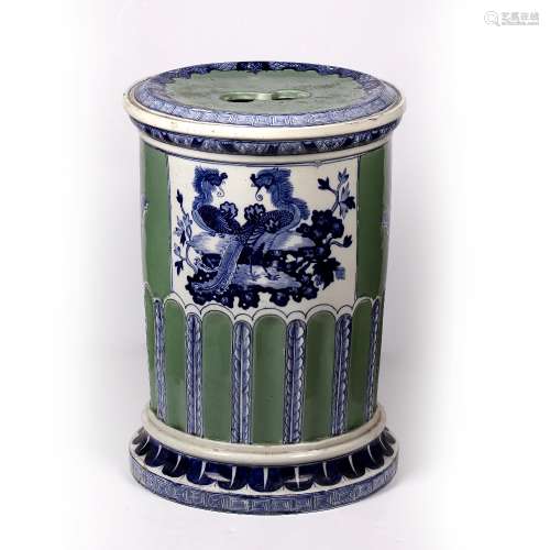Porcelain garden seat Chinese of barrel form, decorated to the body with precious objects on green