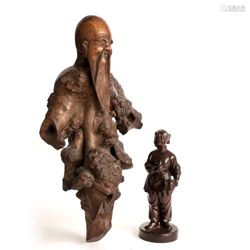 Root carving Chinese, 19th Century carved with a bearded sage's head above a gnarled body, 40cm