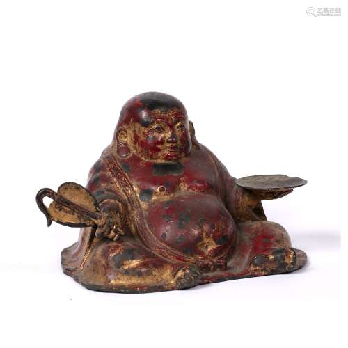 Painted metal seated putti Chinese, 19th Century the figure holding a fan in his right hand and bowl