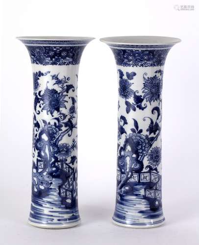 Pair of blue and white porcelain gu form vases Chinese, 19th Century each with a fence design and