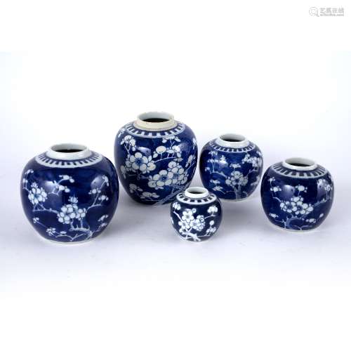 Group of five blue and white ginger jars Chinese each decorated with prunus blossom, largest 14cm