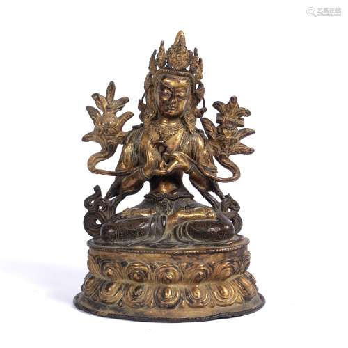Gilt bronze figure of Nagaraja Chinese, 17th/18th Century the cast figure seated on a double lotus