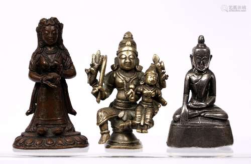 Three cast metal models of deities Tibetan, 19th Century comprising of a standing figure with the