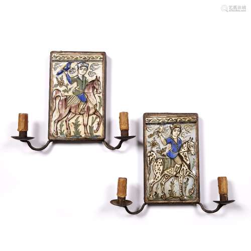 Pair of Qajar tiles Iran depicting figures on horseback, later converted into wall lights to the