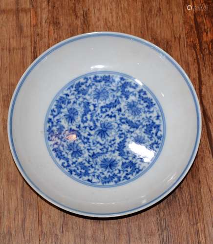 Blue and white dish Chinese decorated to the interior with a central roundel depicting floral