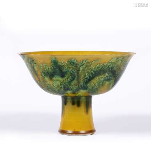Yellow ground stem cup Chinese, 19th Century decorated in green enamel to the exterior depicting a