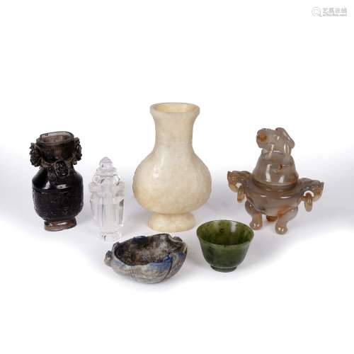 Six hardstone carvings Chinese comprising of a quartz vase with carved taotie decoration to the