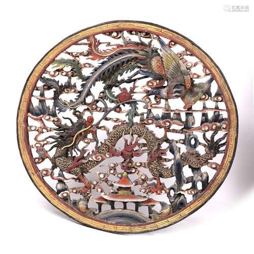 Carved wooden panel Chinese, 20th Century decorated in polychrome colours, with pierced carving