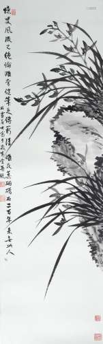 Xu Zonghao (1880-1957) orchids growing on rocks, scroll, ink on paper with artists seal mark, 92cm x