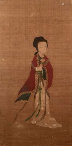 Mounted silk scroll Chinese, 18th/19th Century depicting a female figure holding a lotus in her left