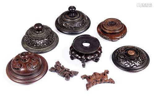 Group of carved pieces Chinese including four hardwood covers, two stands and two part stands carved