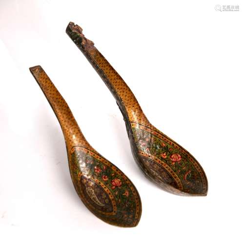 Two Qajar wooden spoons Iran, 19th Century decorated with early Qajar colouring and patterns, 24cm