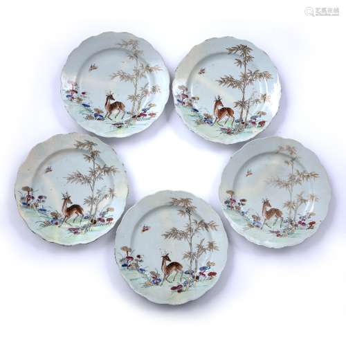 Set of five famille rose plates Chinese, 18th Century each painted with a deer beneath a palm