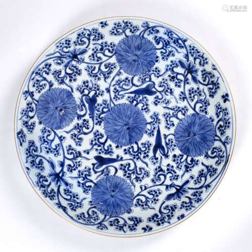 Large blue and white charger Chinese, Kangxi (1662-1722) painted with lotus flowers and trailing