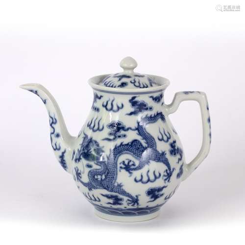 Blue and white teapot Chinese decorated to the body in underglaze blue depicting a dragon in flight,