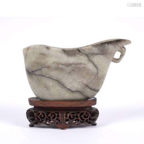 Grey and black jade libation cup Chinese, 19th Century Song style of flattened cup form with