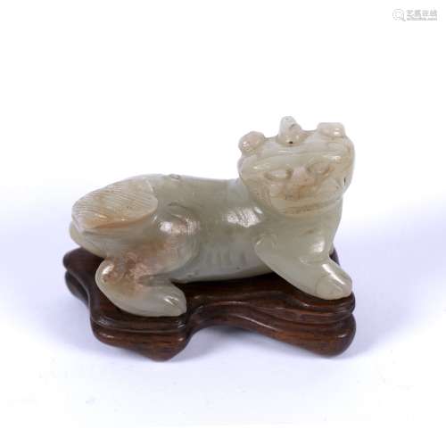 Mutton fat jade carving of a Buddhistic lion Chinese, Ming style standing four square with head