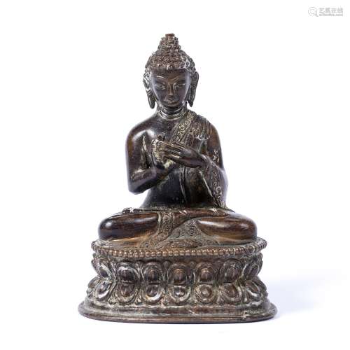 Bronze figure of the Buddha Shakyamuni Sino-Tibetan, 18th/early 19th Century seated in dhayanasana