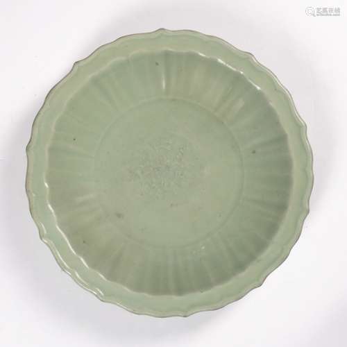 Celadon Longquan charger Chinese, Ming (1368-1644) the glazed dish of foliate form, with central