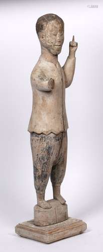 Carved wooden figure Chinese depicted standing, with one arm raised, standing on a raised plinth,